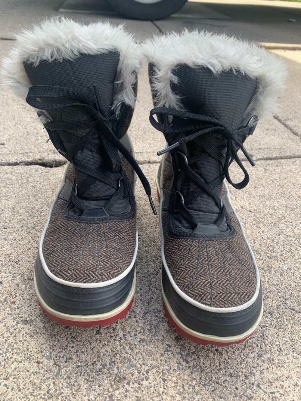 Women's Sorel Faux Fur Winter Lace-Up Boots in Brown and Black